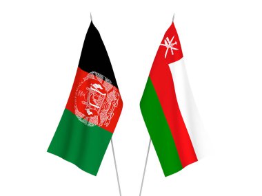 National fabric flags of Sultanate of Oman and Islamic Republic of Afghanistan isolated on white background. 3d rendering illustration.
