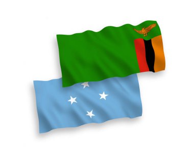 Mikronezya Federasyonu ve Zambiya Cumhuriyeti 'nin ulusal taşıyıcı kumaş bayrakları beyaz arka planda izole edildi. 1 'e 2 oranında.