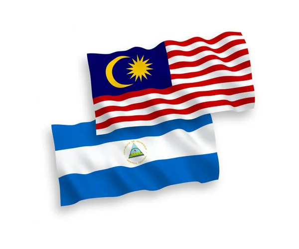 Bendera Gelombang Vektor Nasional Nikaragua Dan Malaysia Diisolasi Dengan Latar - Stok Vektor