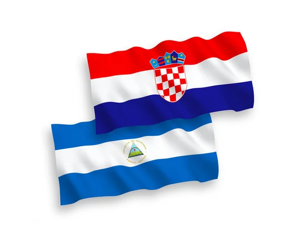 니카라과와 크로아티아의 국기는 바탕에 게양되었다 — 스톡 벡터
