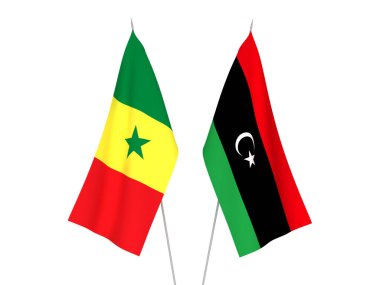 Libya ve Senegal Cumhuriyeti 'nin ulusal kumaş bayrakları beyaz arka planda izole edildi. 3d resimleme.