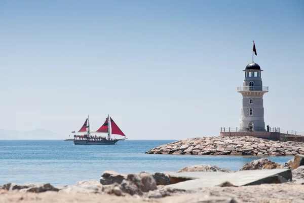 Lighthouse and ship — Stock Photo, Image