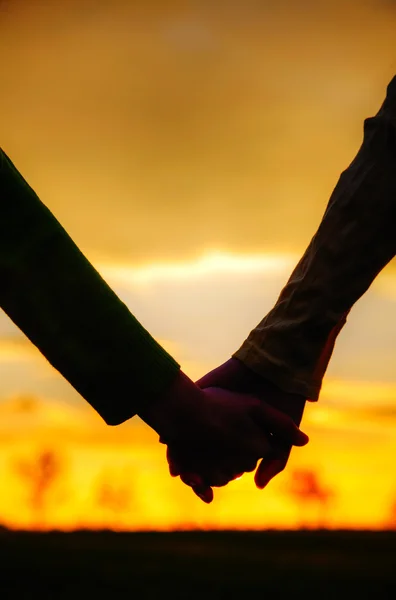 Teen girls holding hands — Stock Photo, Image