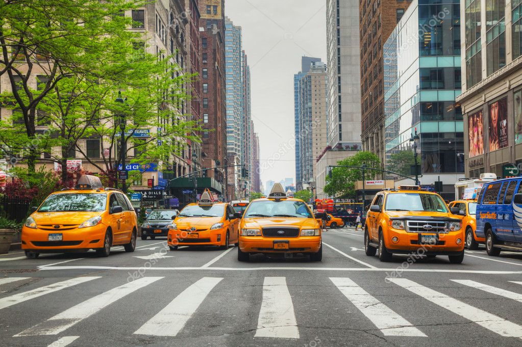 Yellow taxis at the New York City street Stock Editorial Photo