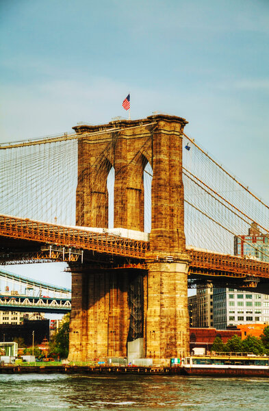 Brooklyn bridge in New York City on a sunny day