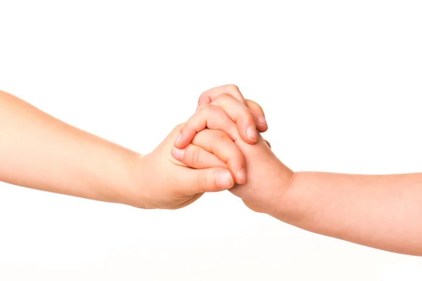 Dua anak berpegangan tangan. . — Stok Foto