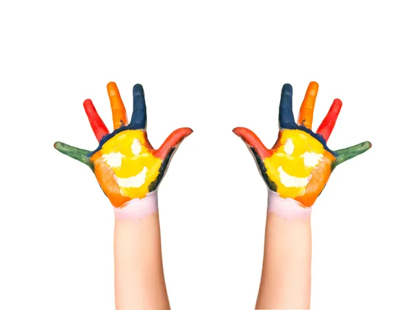 Die beiden bunten Hände mit Lächeln bemalt mit verschiedenen Kinderfarben als Logo. — Stockfoto