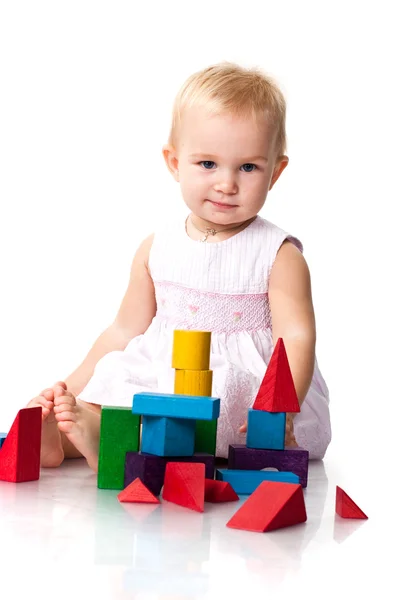 Beautiful baby building a castle — Stock Photo, Image