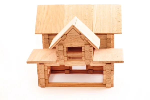 Juguete casa de madera aislada en blanco — Foto de Stock