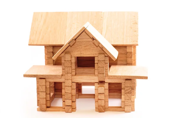 Juguete casa de madera aislada en blanco — Foto de Stock