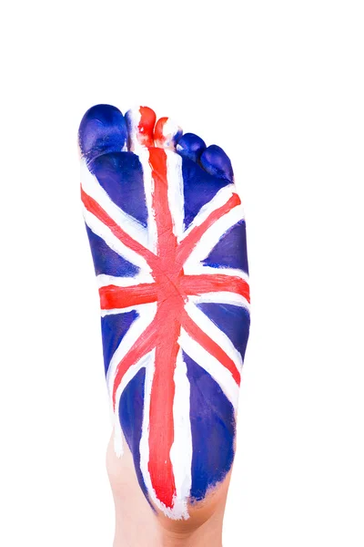 The UK flag on a foot. Travelling to England concept. Eurotrip. — Stock Photo, Image