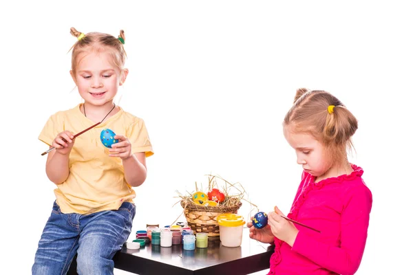 Two happy kids painting easter eggs. Happy Easter — Stock Photo, Image