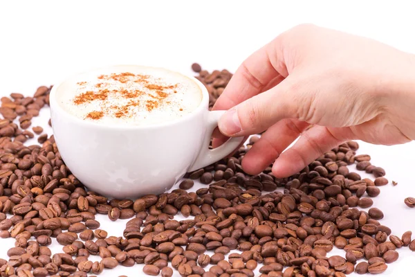 Hand holding a cup of coffee — Stock Photo, Image