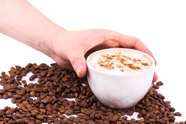 Hand holding a cup of coffee — Stock Photo, Image