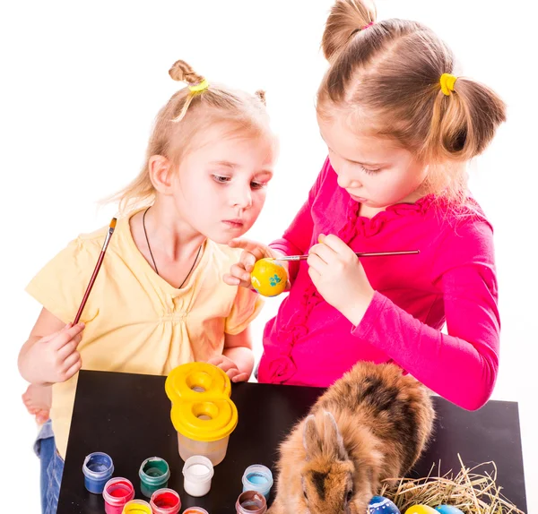 Two happy kids painting easter eggs. Happy Easter — Stock Photo, Image