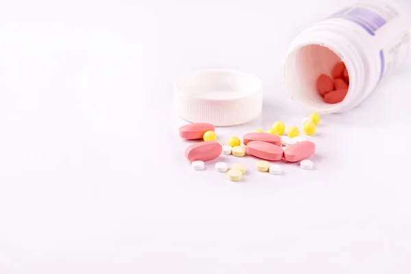 Medicine and pills scattered around — Stock Photo, Image