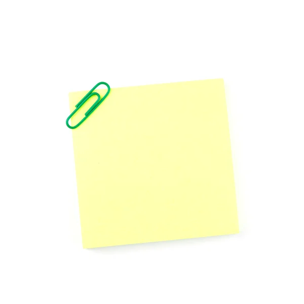 Yellow paper note with a green clip — Stock Photo, Image