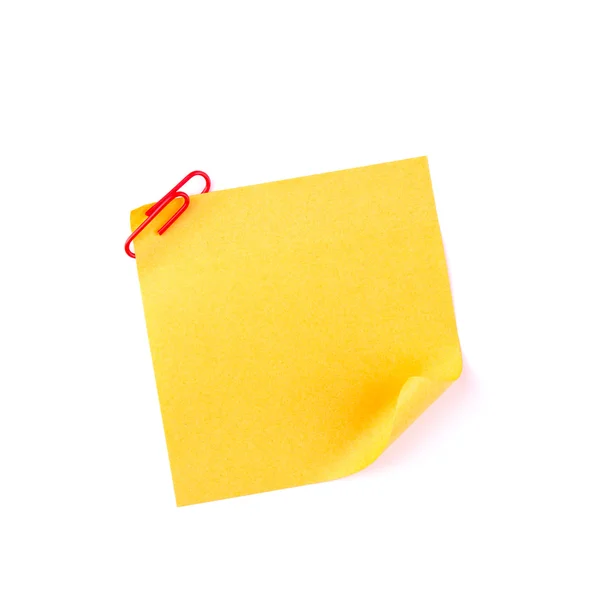 Orange sticky paper note with a red clip — Zdjęcie stockowe