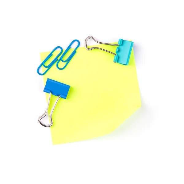 Neon yellow paper note with blue clips — Zdjęcie stockowe