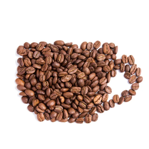 Кофейные зерна в форме кофейной чашки — стоковое фото