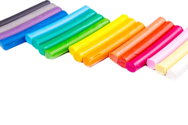 Barras de plastilina de colores arco iris, modelado de arcilla —  Fotos de Stock