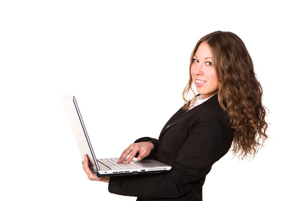 Bella donna d'affari fiduciosa con computer portatile — Foto Stock