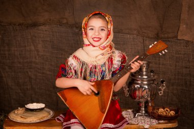 Beautiful russian girl in a shawl clipart