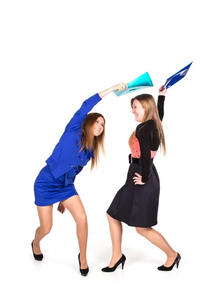 Two beautiful business girls with documents fighting — Stock Photo, Image