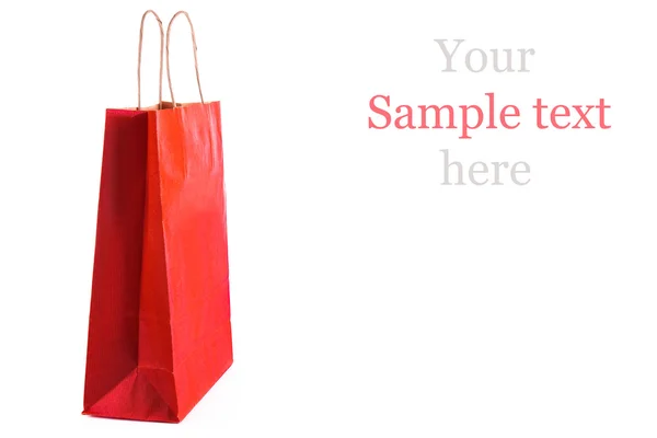 Red paper shopping bag isolated. Shopping concept. — Stock Photo, Image