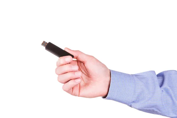 Mannenhand bedrijf zwarte usb geheugen flash drive, opslag van gegevens of computer verbindingsapparaat met USB-kabel — Stockfoto