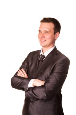 Beyaz arka plan üzerinde izole mutlu genç gülümseyen işadamı portresi