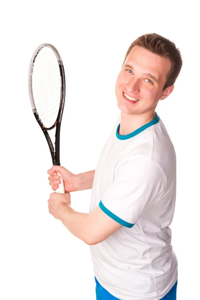 Deportivo joven jugando al tenis —  Fotos de Stock