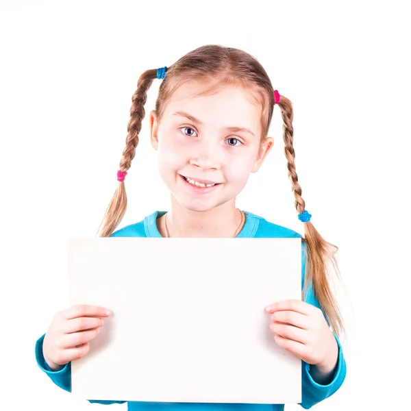 Smiling little girl holding white card for you sample text — Stock Photo, Image