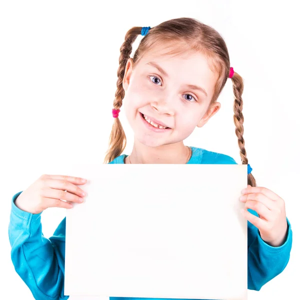 Smiling little girl holding white card for you sample text — Stock Photo, Image