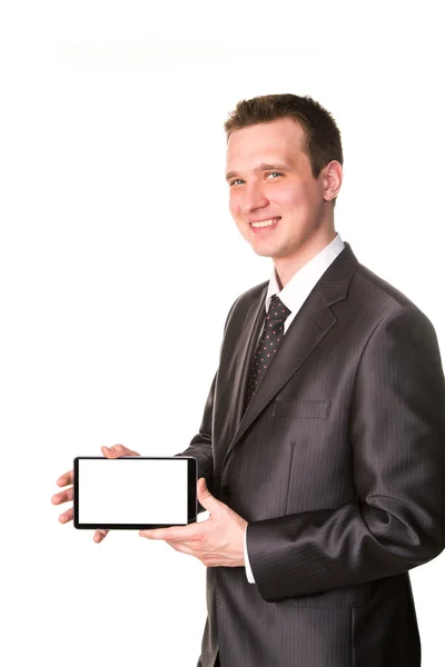 Mladý podnikatel ukazující tablet pc výpočetní s prázdnou obrazovkou pro ukázku textu — Stock fotografie