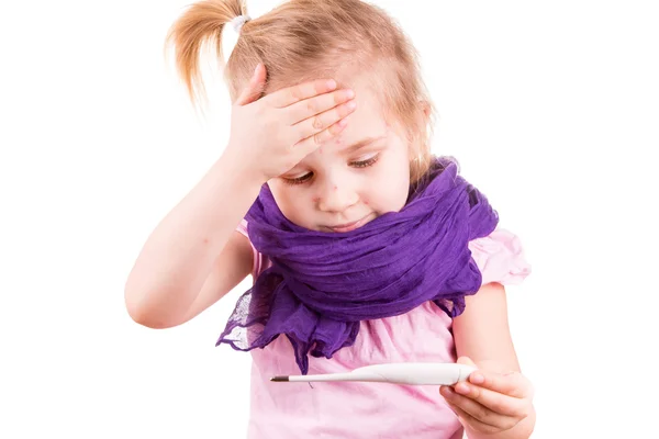 Sick little girl with chickenpox measuring temperature and checking her forhead — Stock Photo, Image