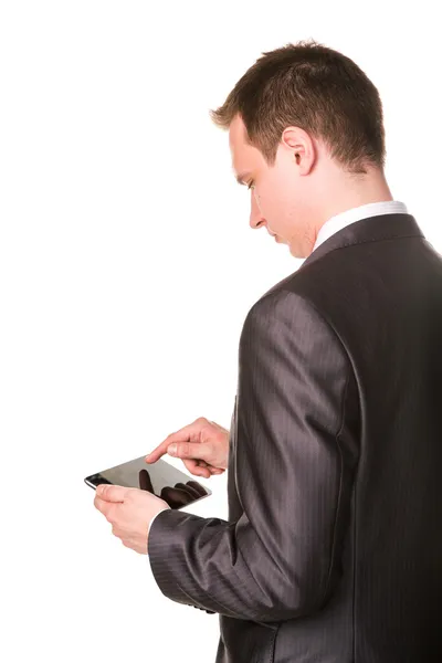 Young businessman working on a tablet pc comuter — Stock Photo, Image