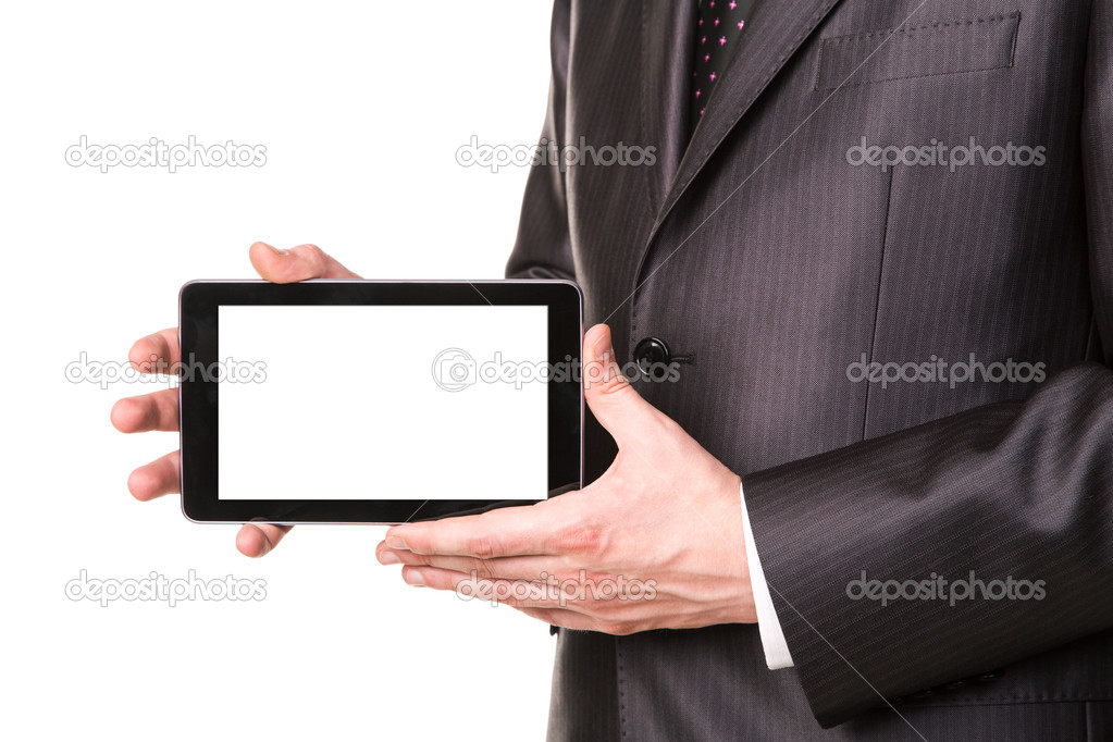 Businessman's hand showing a tablet pc comuter with blank screen