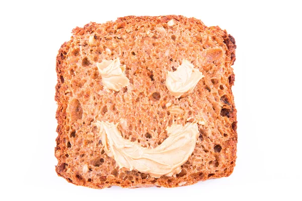 Peanut butter sandwich with a smile — Stok fotoğraf