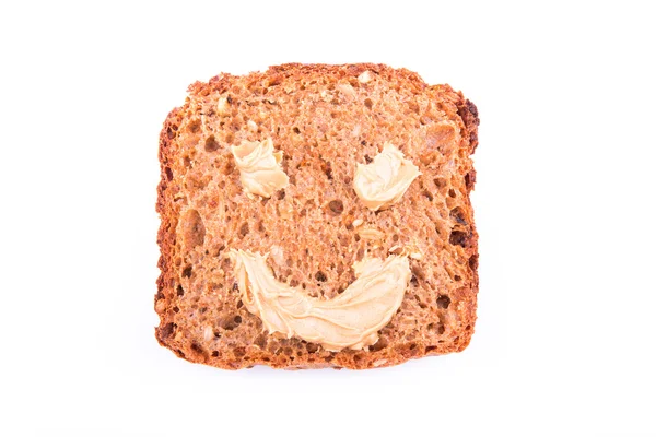 Peanut butter sandwich with a smile — Stok fotoğraf