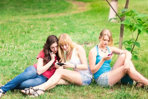 Group Of happy smiling Teenage Students outdoor Stock Photo