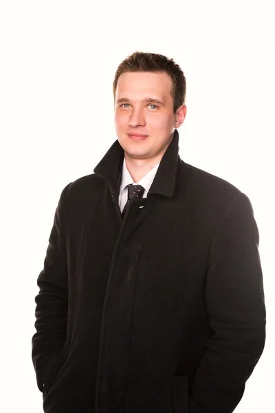 Handsome young businessman in a coat isolated — Stock Photo, Image