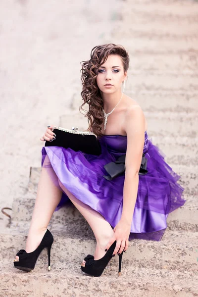 Beautiful young girl in a beautiful dress outdoor — Stock Photo, Image