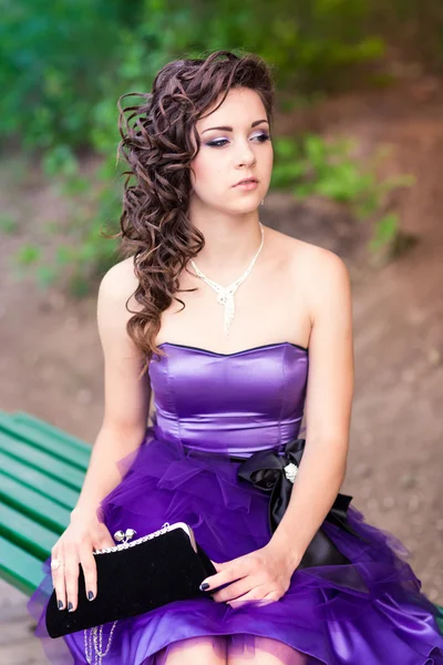 Beautiful young girl in a beautiful dress outdoor — Stock Photo, Image