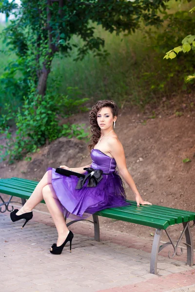 Beautiful young girl in a beautiful dress outdoor — Stock Photo, Image