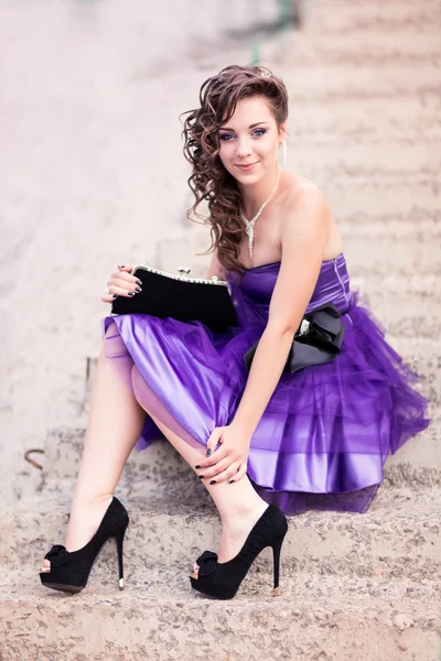 Beautiful young girl in a beautiful dress outdoor — Stock Photo, Image