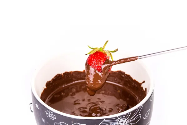 Fondue au chocolat aux fruits isolés sur blanc — Photo