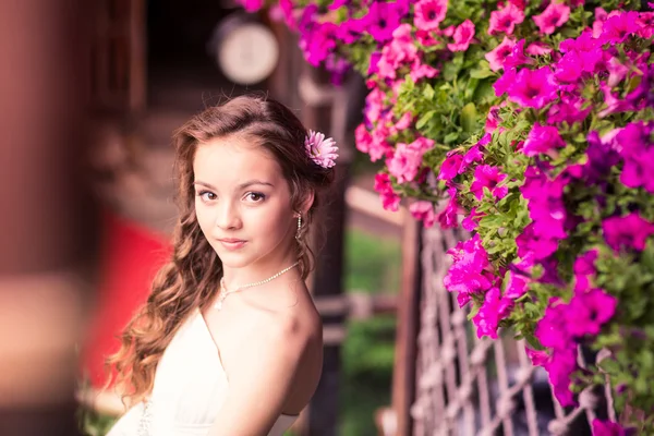 Charming little girl in a beautiful dress outdoor — Stock Photo, Image