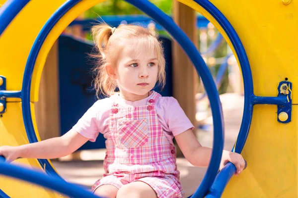 Beautiful little girl on outdoor playground — Stock Photo, Image