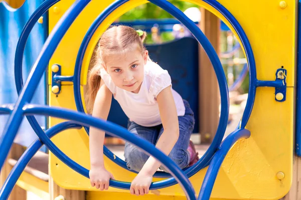 Beautiful little girl on outdoor playground — Stock Photo, Image